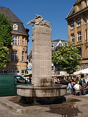 Market fountain in Castrop-Rauxel, photo by Arnoldius, license: CC-BY-SA-3.0, original URL: http://commons.wikimedia.org/wiki/File:Castrop-Rauxel_fountain_at_marketplace.jpg